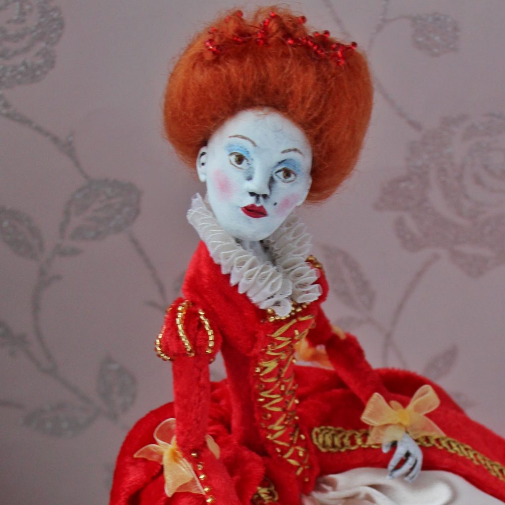 Queenie, clay art doll with ribbon joints