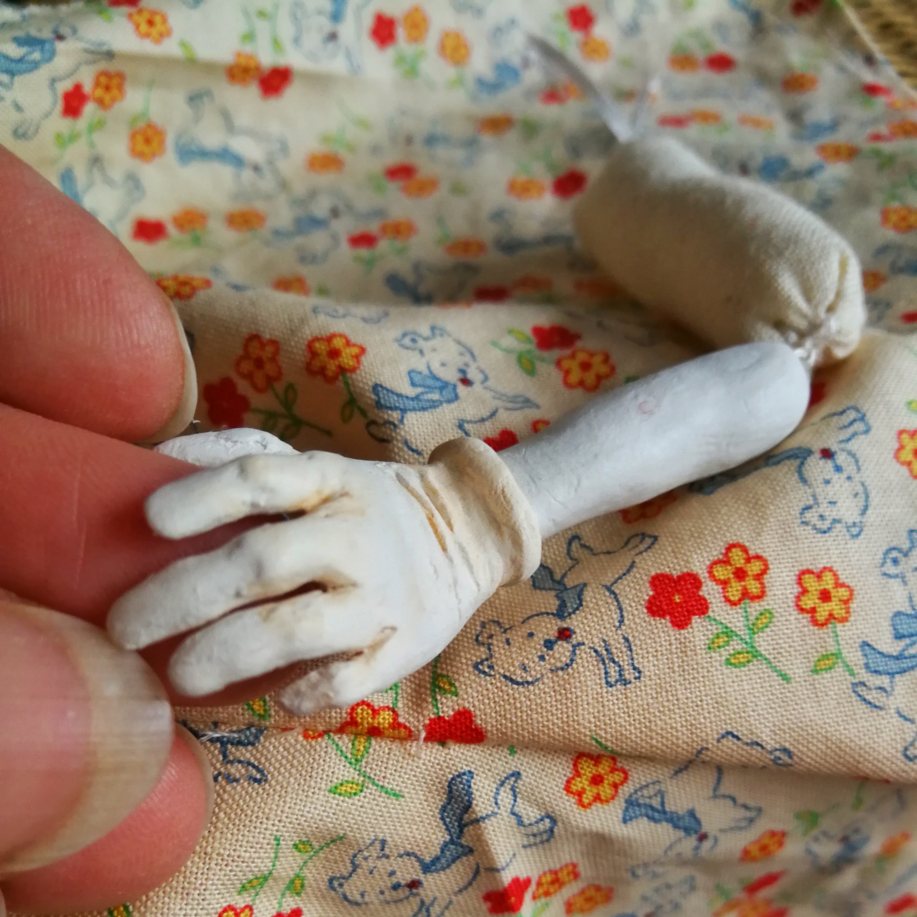 close up of a hand in air-dry clay