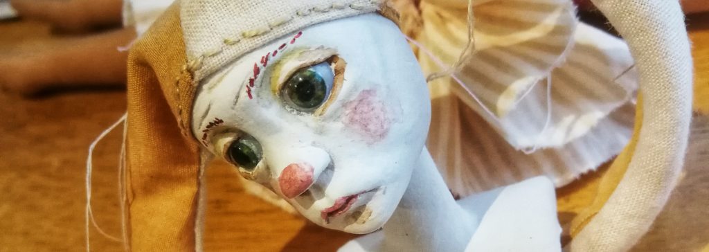 sad clown art doll