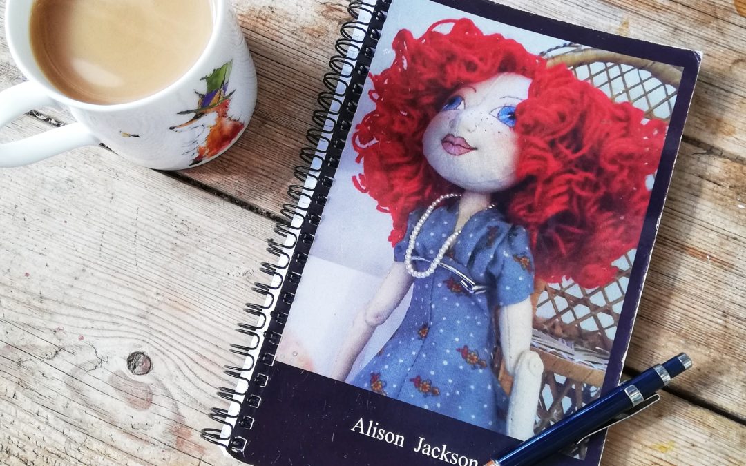 Notebook with Art Doll on cover