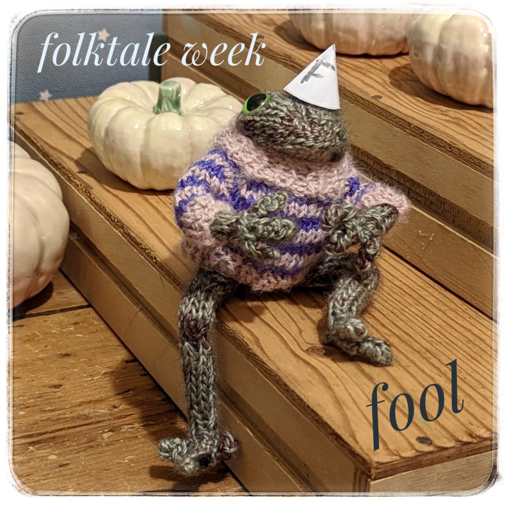 Knitted Frog with a fools hat on