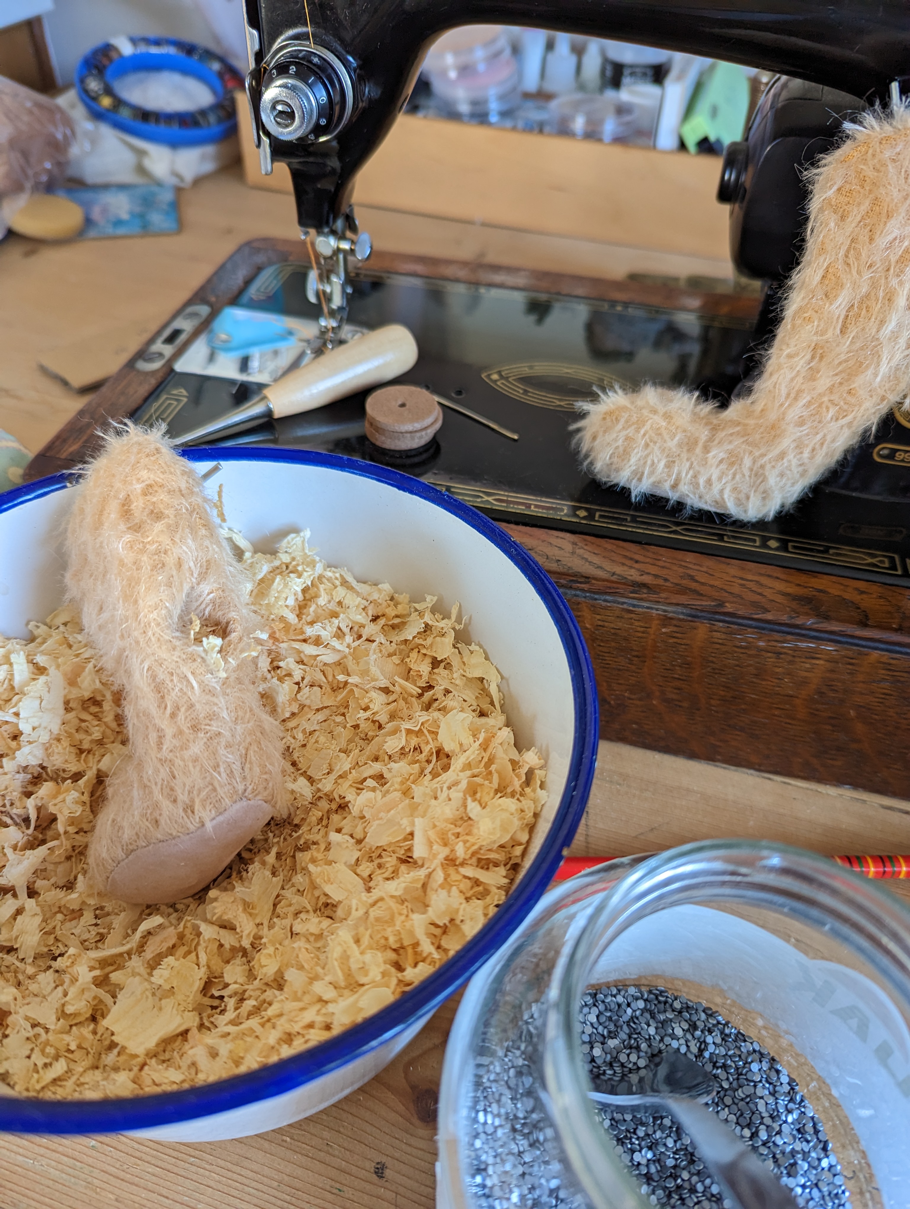 stuffing a traditional teddy with sawdust