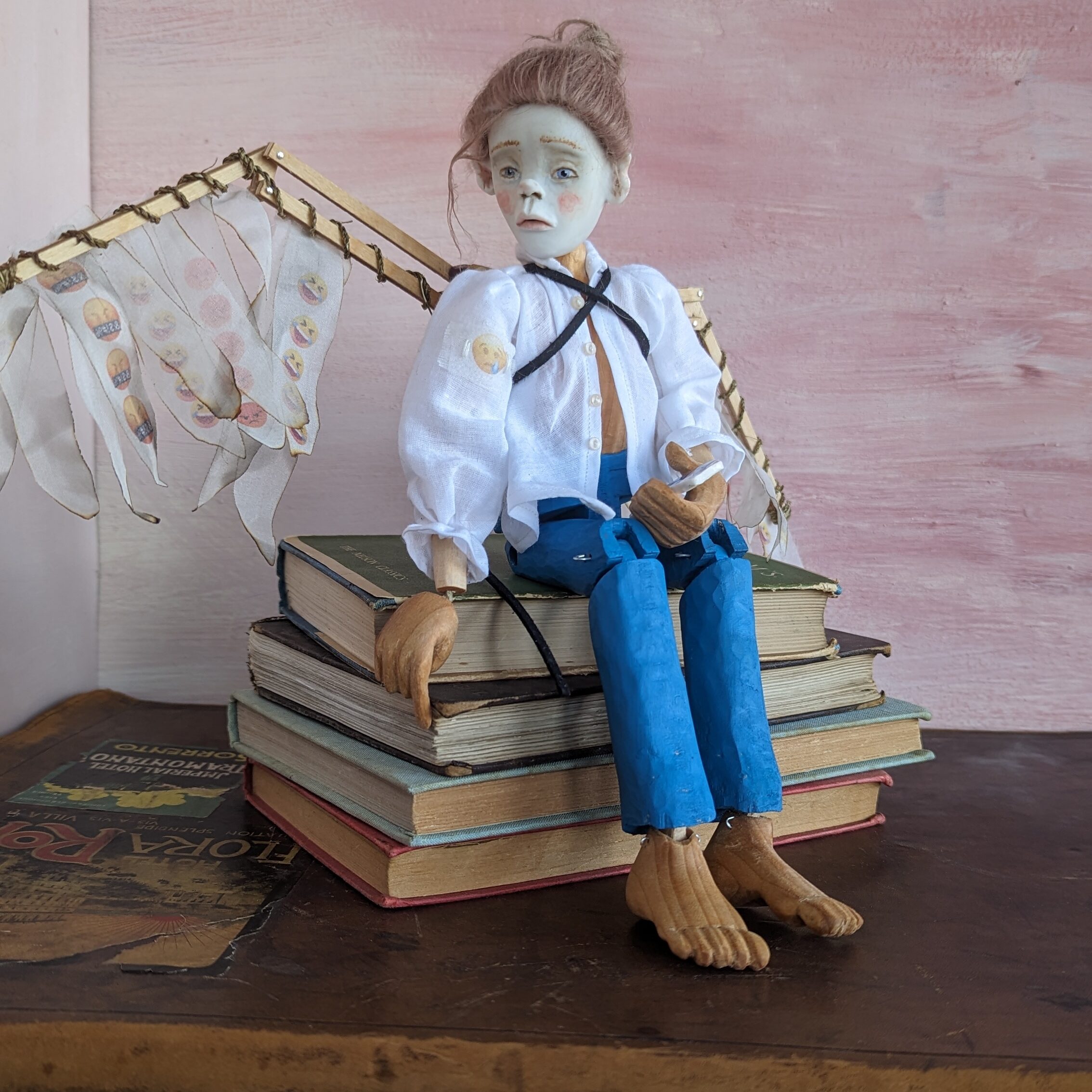 wooden and porcelain art doll