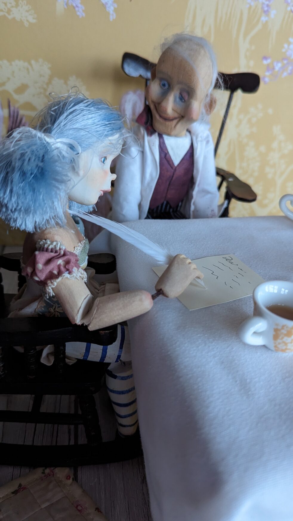 lilibet a wooden art doll writes a letter