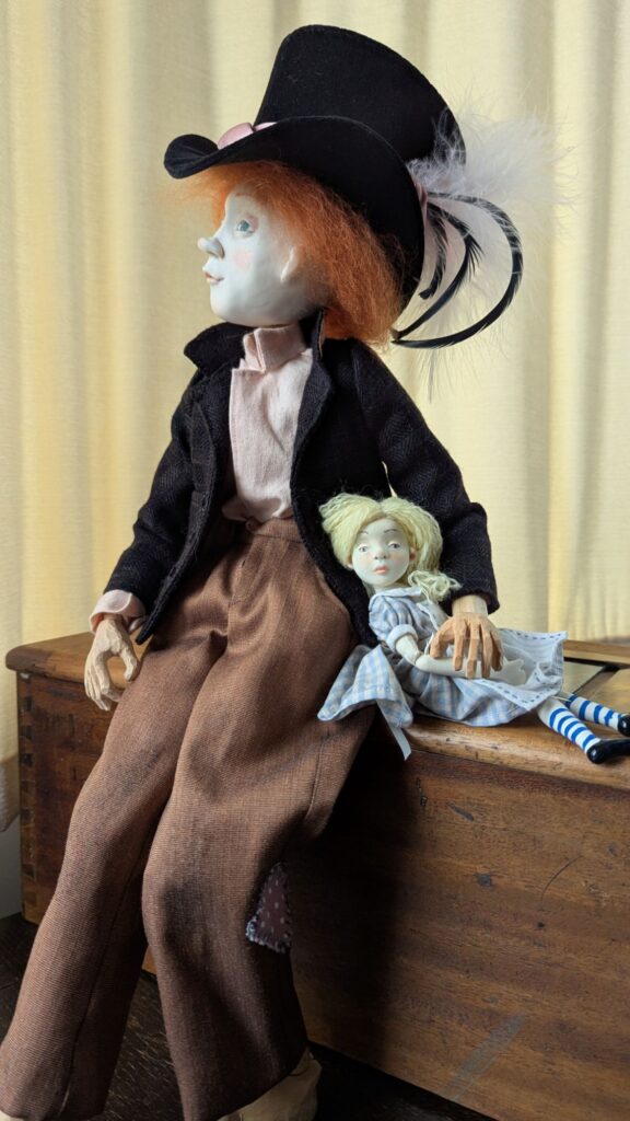 Mad Hatter and Alice porcelain dolls