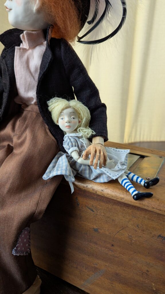 mad hatter and Alice porcelain dolls