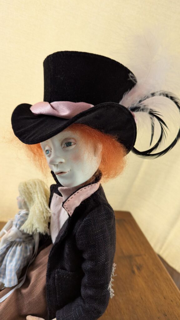 mad hatter and Alice porcelain dolls